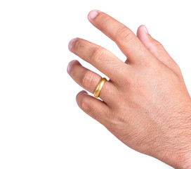 Golden ring on finger isolated on white background