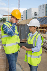 View of Co-workers working on a construction site