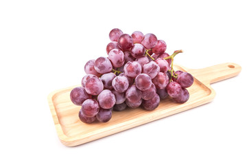 Bunch of red grapes isolated on white background
