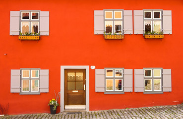 Colorful orange facade of a house in Germany