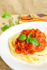 Spaghetti in red tomato sauce, vegetarian homemade dish, mediterranean food 