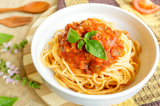 Spaghetti in red tomato sauce, vegetarian homemade dish, mediterranean food 