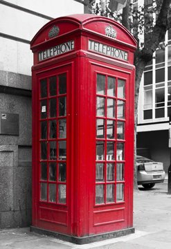 Traditional English Red phone box in the street