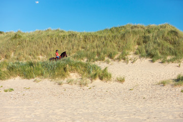 cavalière en bord de mer