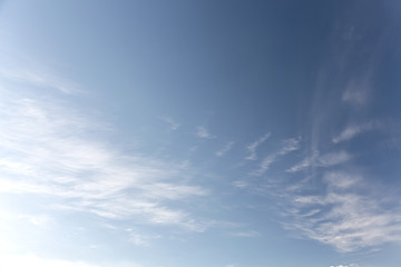 clean blue sky with several white clouds during sunny days