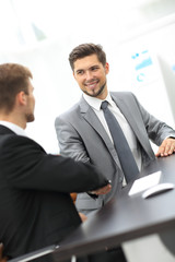 Business man shaking hand to partner