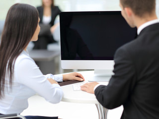 Business meeting at the table with computer