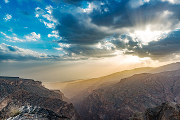 Sunset at Jabal Akhdar in Al Hajar Mountains, Oman. It extends about 300 km northwest to southeast, between 50-100 km inland from the Gulf of Oman coast.