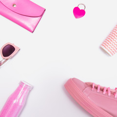 funky pink set with shoe and accessories. negative space in the middle