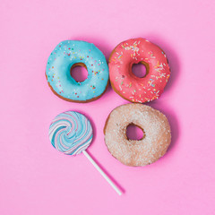 three donuts and lollipop in creative fashion style
