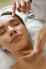 Facial Skincare. Woman Receiving Oxygen Peeling Beauty Treatment