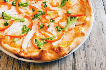 pizza on wooden background