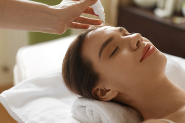 Fototapeta na wymiar Face Skin Care. Woman Receiving Serum Treatment In Beauty Salon