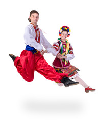 dancing couple in polish national traditional costume jumping, full length portrait isolated