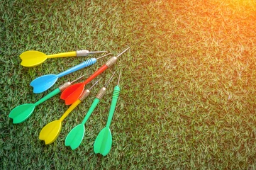 Tuinposter business vision concept with colorful dart arrow © whyframeshot