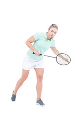 Obraz na płótnie Canvas Pretty blonde playing badminton 