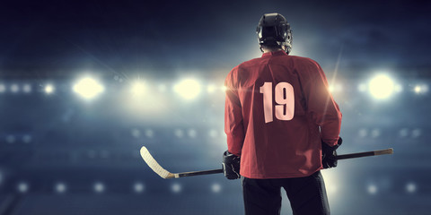 Hockey player on ice  . Mixed media