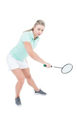 Obraz na płótnie Canvas Pretty blonde playing badminton 