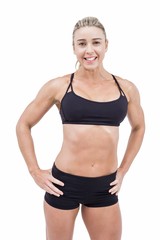 Plakat Female athlete posing with hands on hip