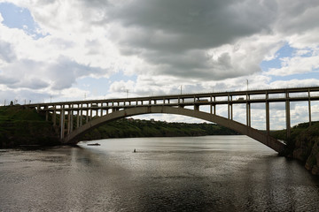 Fototapeta na wymiar bridge across the Dnieper River in Zaporozhye cloudy day