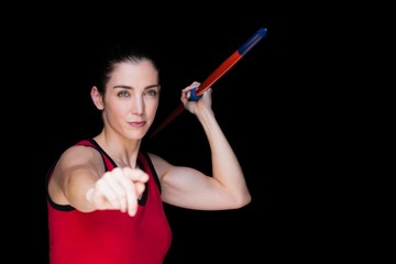 Female athlete throwing a javelin 