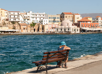 Tavernas and restaurants surrounding the harbour of Chania, Crete, Greece © wjarek
