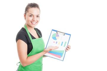 Cheerful female employee presenting clipboard