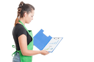 Young employee read the data on clipboard