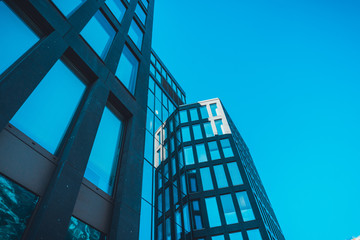 Obraz premium Low angle view on tall office building