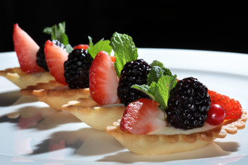 cake with strawberries and blackberries