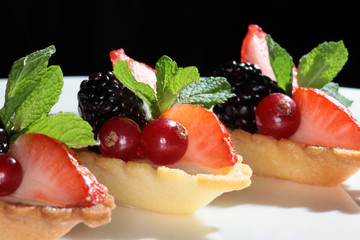 cake with strawberries and blackberries