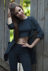 Portrait Of Young Smiling Beautiful Woman. Portrait of a fresh and beautiful young fashion model posing outdoor in sunny weather. woman portrait. smiling girl in city street