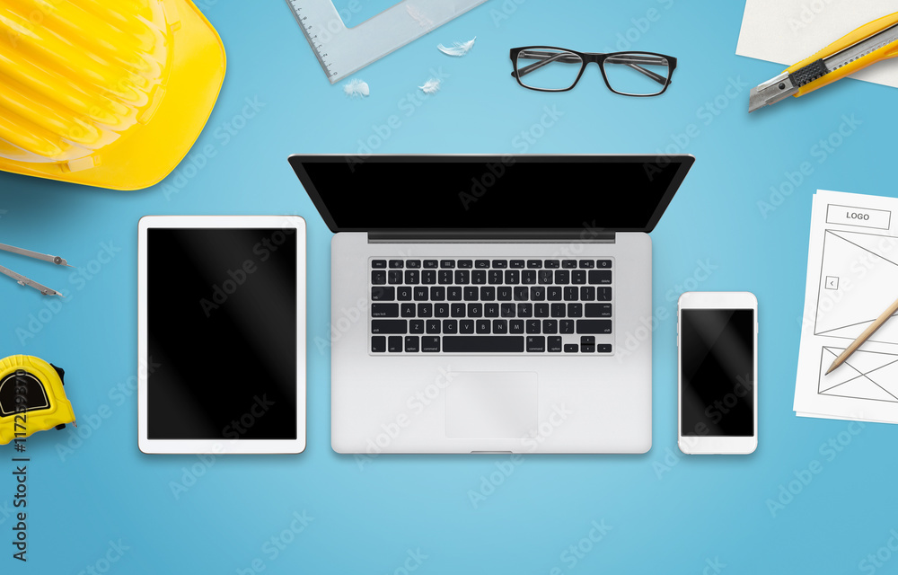 Sticker laptop computer, tablet and smart phone on designer desk. mockup for responsive web site promotion.