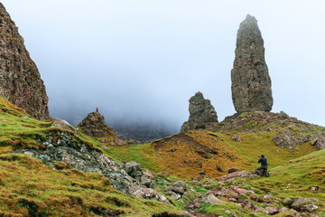 Photographer taking a picture for an outdoor campaign, The old man of Storr