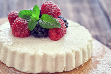 goat cheese with fresh berry fruit and mint