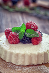 goat cheese with fresh berry fruit and mint