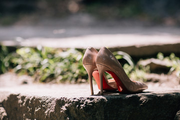 shoes on the floor of the bride