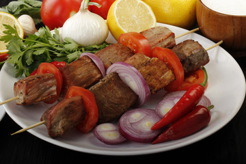 grilled meat on wooden background