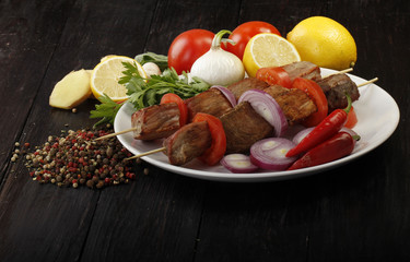 grilled meat on wooden background