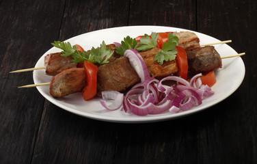 grilled meat on wooden background