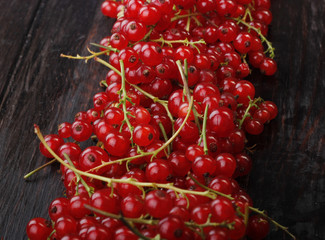 red currant on wooden background