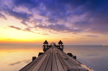 Naklejka na ściany i meble Wooden pier between sunset in Phuket, Thailand
