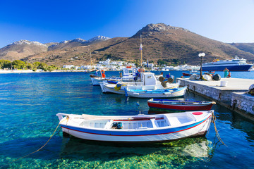 Fototapeta na wymiar traditonal fishing boats in Katapola port, Amorgos island, Greece