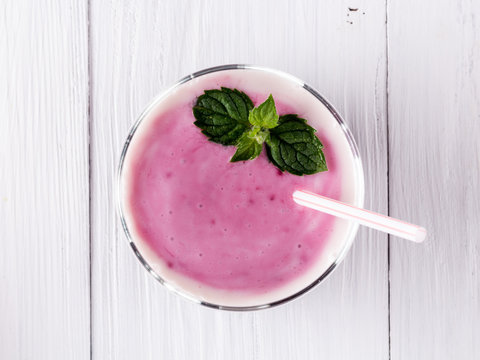 Berry smoothie decorated with mint