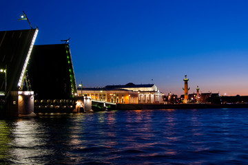 Fototapeta na wymiar Divorced Palace Bridge during the White Nights , St. Petersburg, Russia. July 3, 2010
