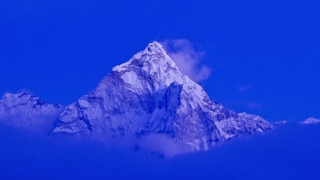 Mountain scenery in Himalayas, Nepal, Ama Dablam at sunset. timelapse