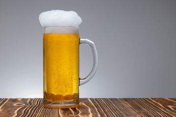 overflowing beer mug