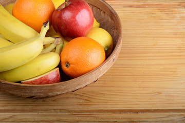 fresh fruits on wooden table. Healthy eating concept