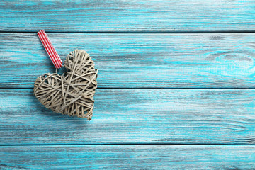 Love heart on a blue wooden background