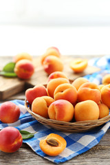 Ripe apricots fruit on grey wooden table